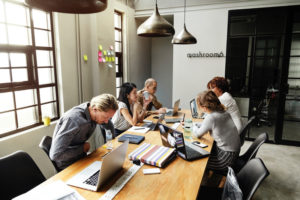 group of adults collaborating at work